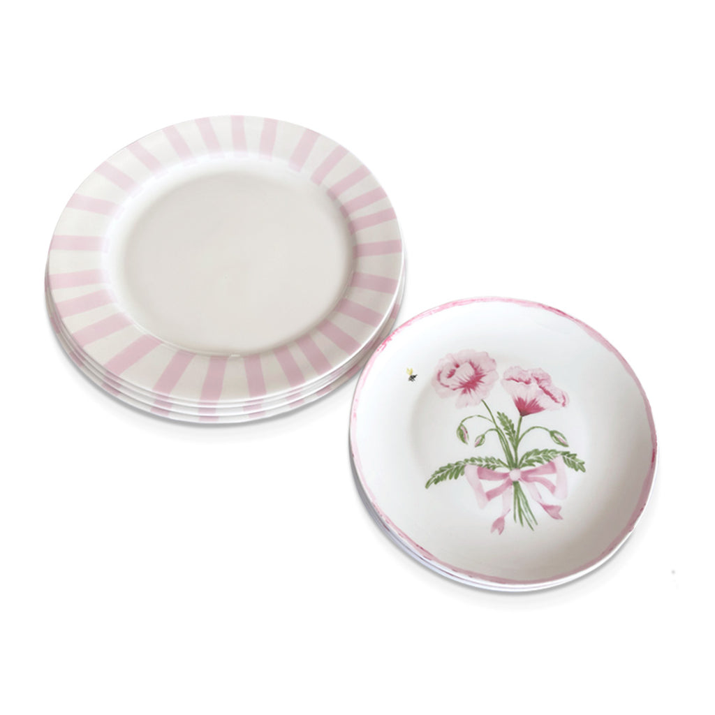 Set de vajilla con platos trinche de rayas rosa claro y plato de ensalada con ilustración de Flor Lisianthus rosas, marca Zash