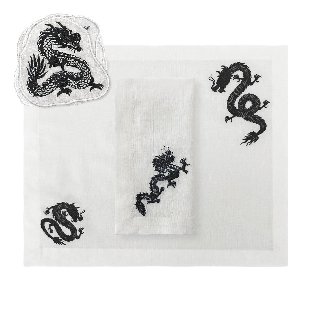 Set de mantelería en Lino Blanco con Dragones bordados en Negro, marca Zash