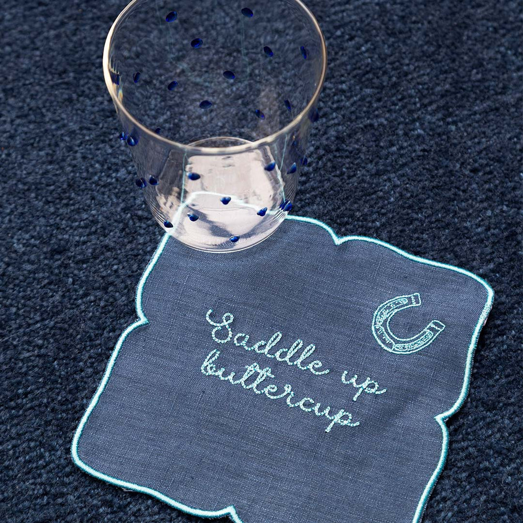 Cocteleras con Frases Vaqueras en Lino Azul con Bordado Turquesa. Set de 4