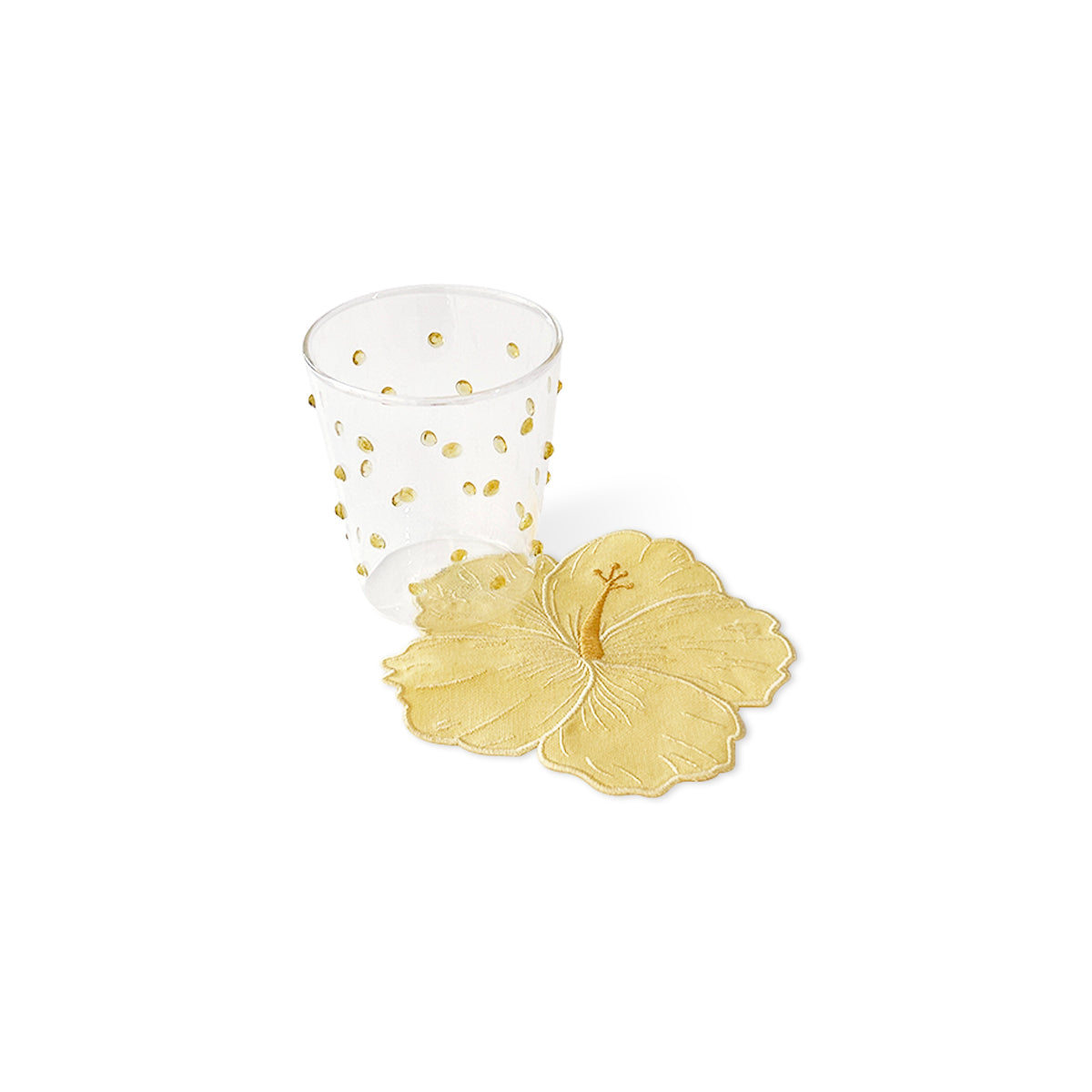 Set de vasos con puntitos amarillos y servilletas cocteleras en forma de flor hibiscus amarilla, marca Zash 