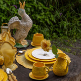 Set de Mantelería Vivi con Individuales y Servilletas en Lino Amarillo con Bordado de Pelitos. Set para 4 personas