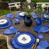 Coasters Vivi en Lino Azul con Bordado de Pelitos. Set de 4