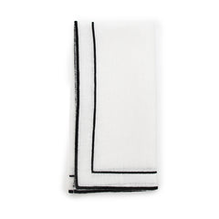 Juego de 4 Servilletas Jimmy en Lino Blanco con Doble Orilla Bordada Negra