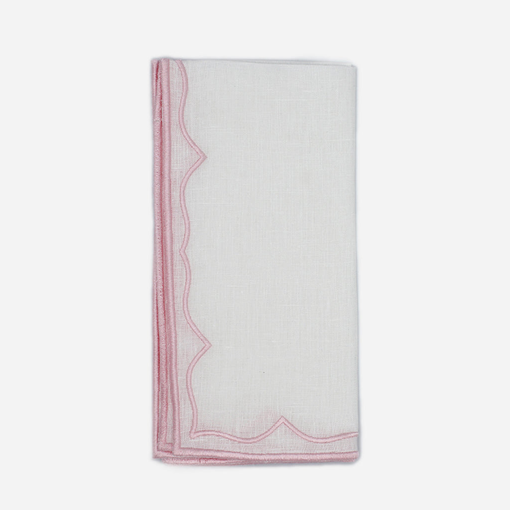 Servilleta Suzy en lino blanco con orilla bordada en rosa claro marca Zash