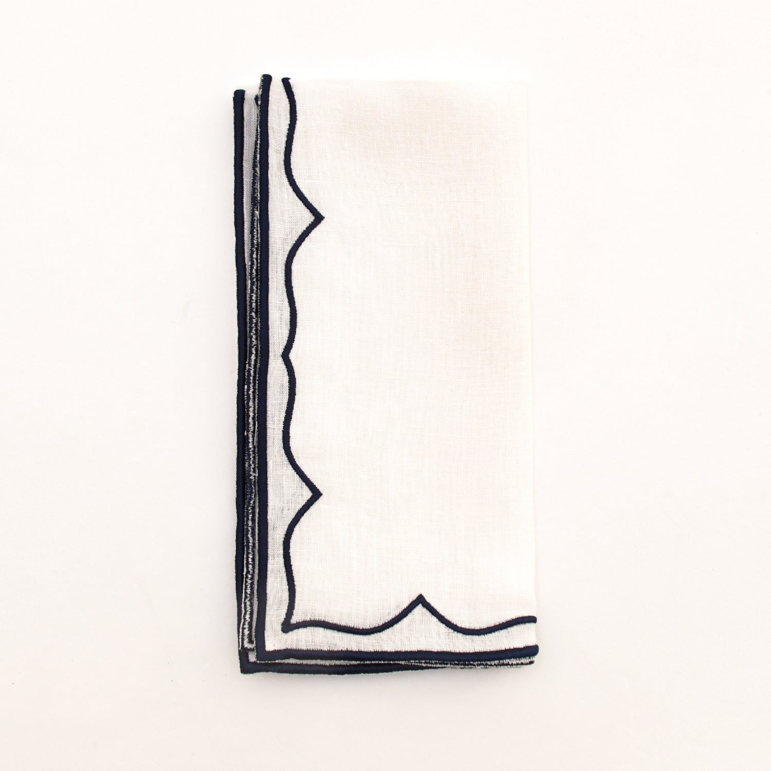 Servilleta Suzy de Lino Blanco con Doble Orilla Bordada Azul Marino, marca Zash