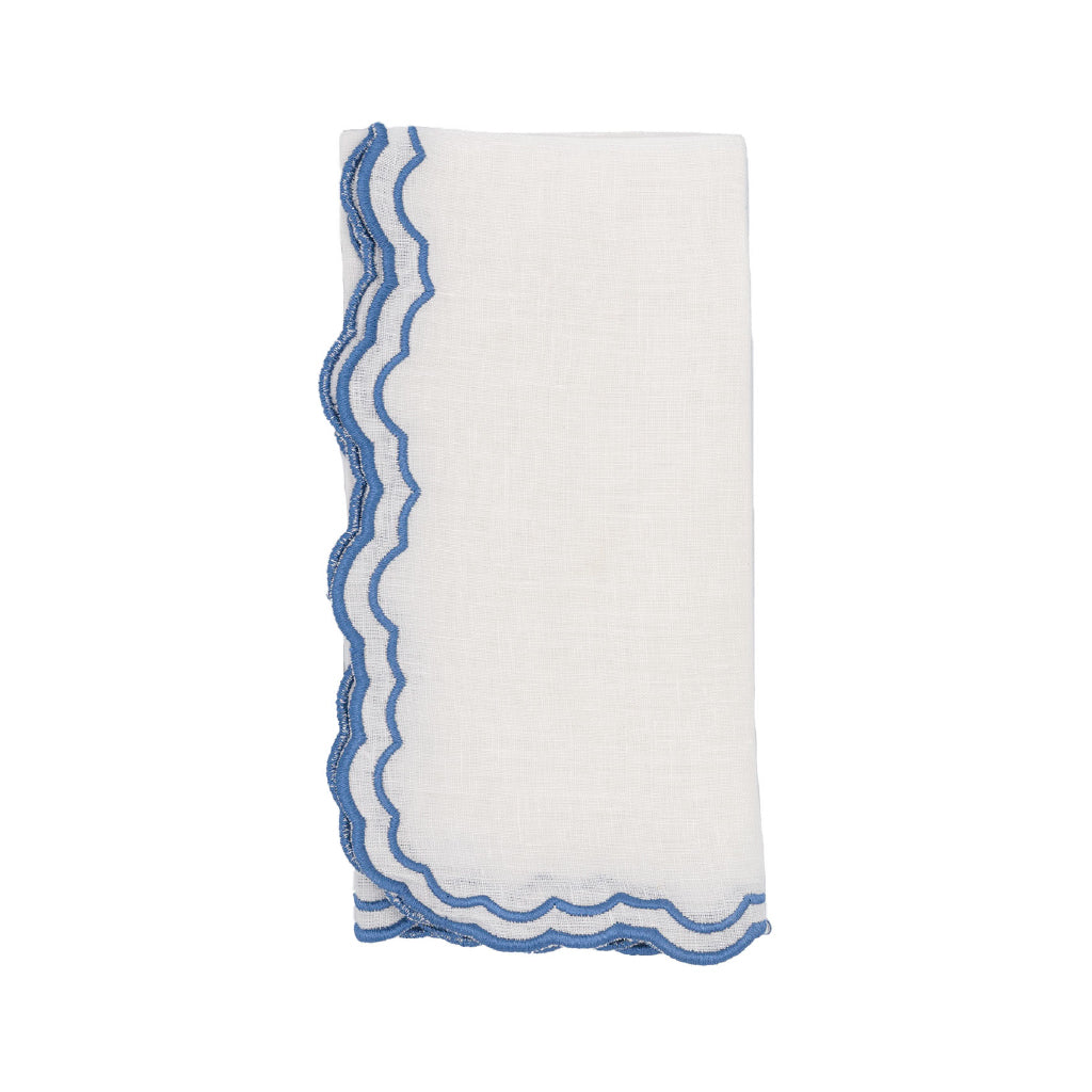 Servilleta Blossom en lino blanco con doble orilla bordada en Azul marca Zash